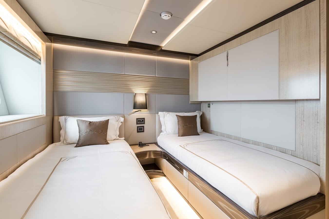 a couple of beds in a room aboard LEGACY Yacht for Sale