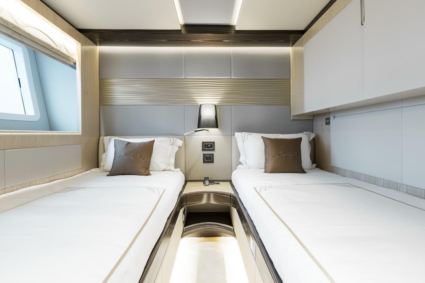 a couple of beds in a room aboard LEGACY Yacht for Sale