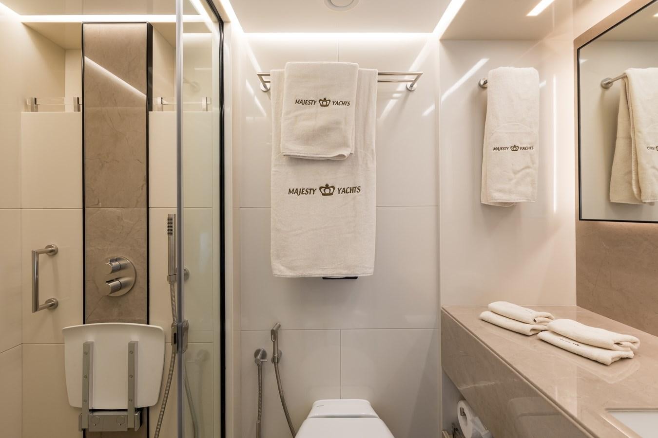 a bathroom with a sink and a toilet aboard LEGACY Yacht for Sale