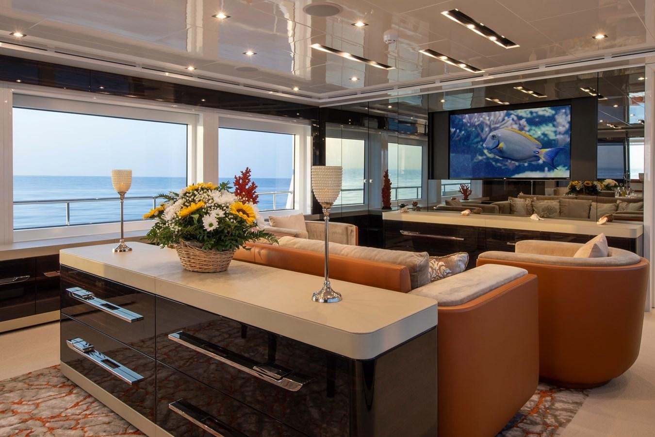 a large room with a large tv aboard OCEAN DREAM Yacht for Sale