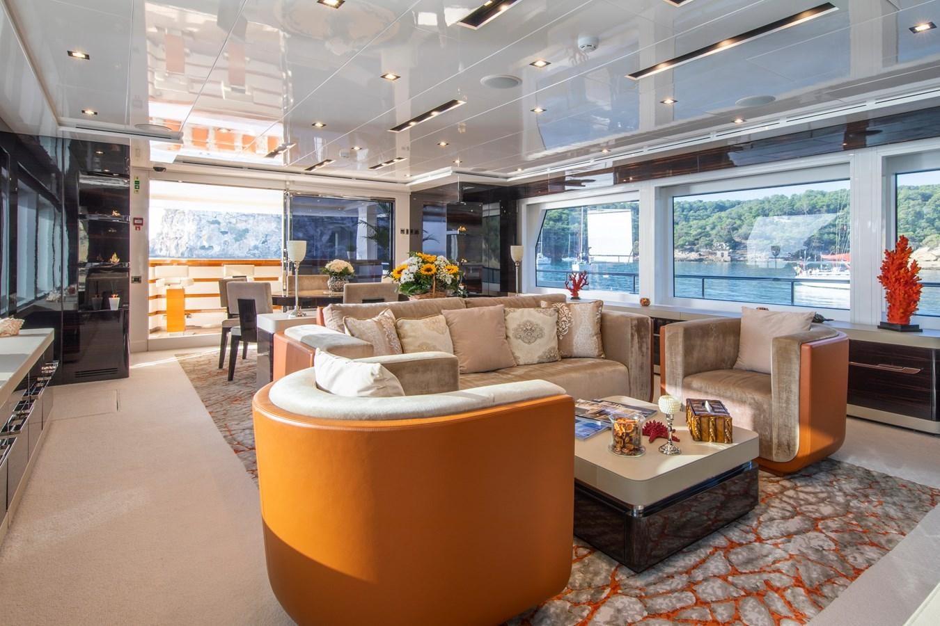 a living room with a large window aboard OCEAN DREAM Yacht for Sale