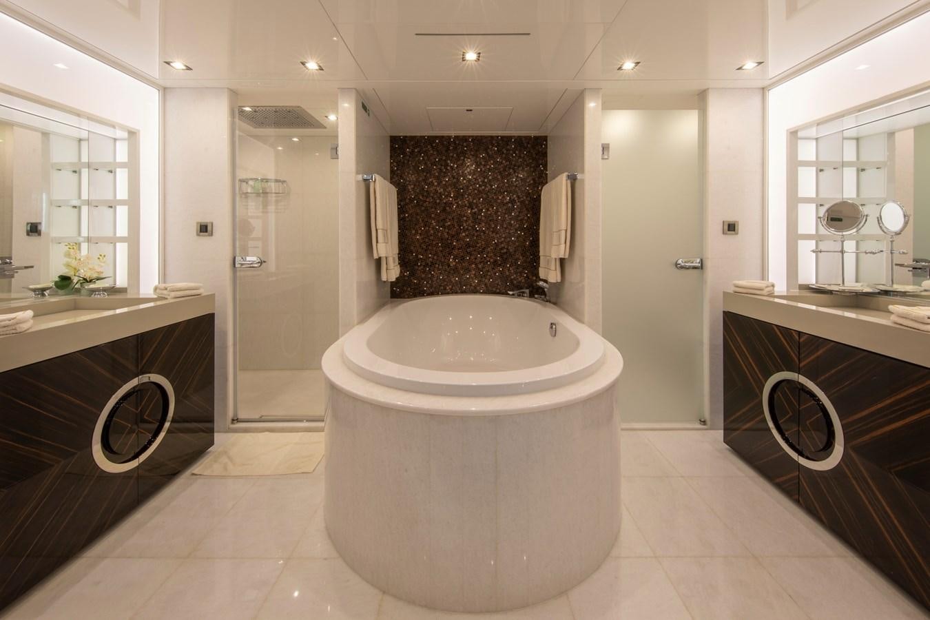 a bathroom with a large tub aboard OCEAN DREAM Yacht for Sale