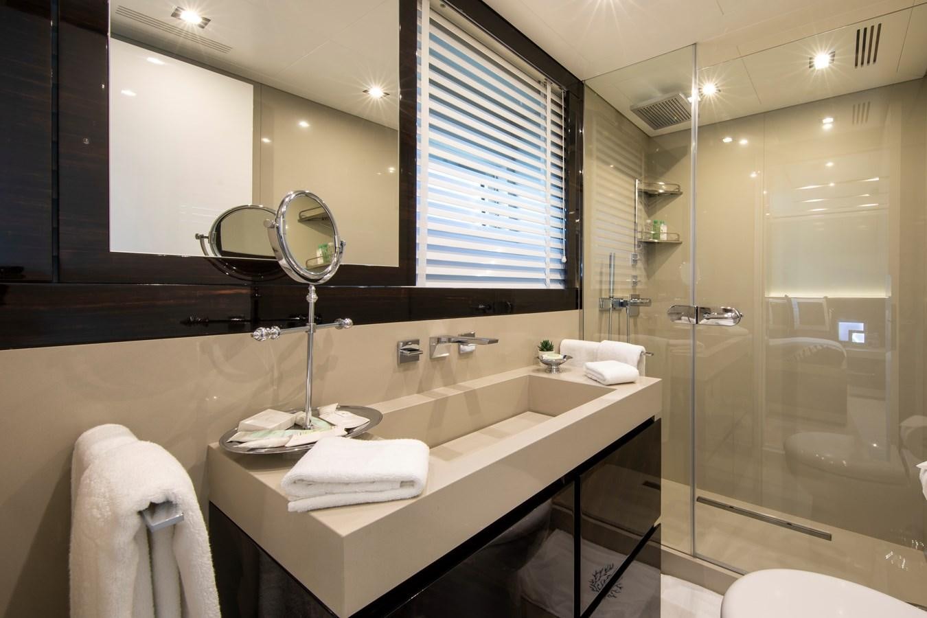 a bathroom with a large mirror aboard OCEAN DREAM Yacht for Sale