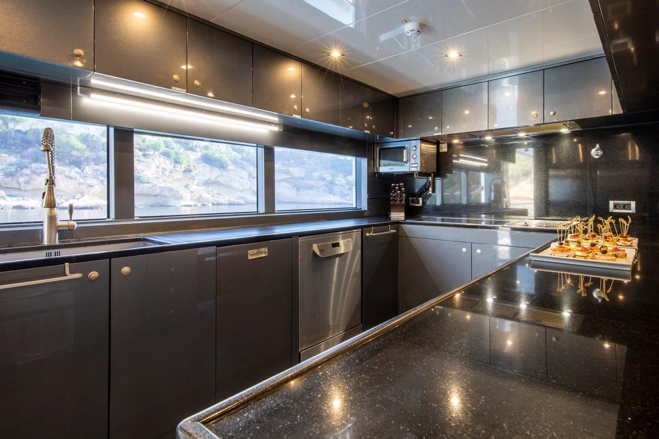 a kitchen with a large counter aboard OCEAN DREAM Yacht for Sale