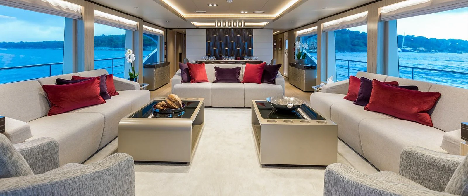 a living room with a couch and a table aboard BARBARA Yacht for Sale