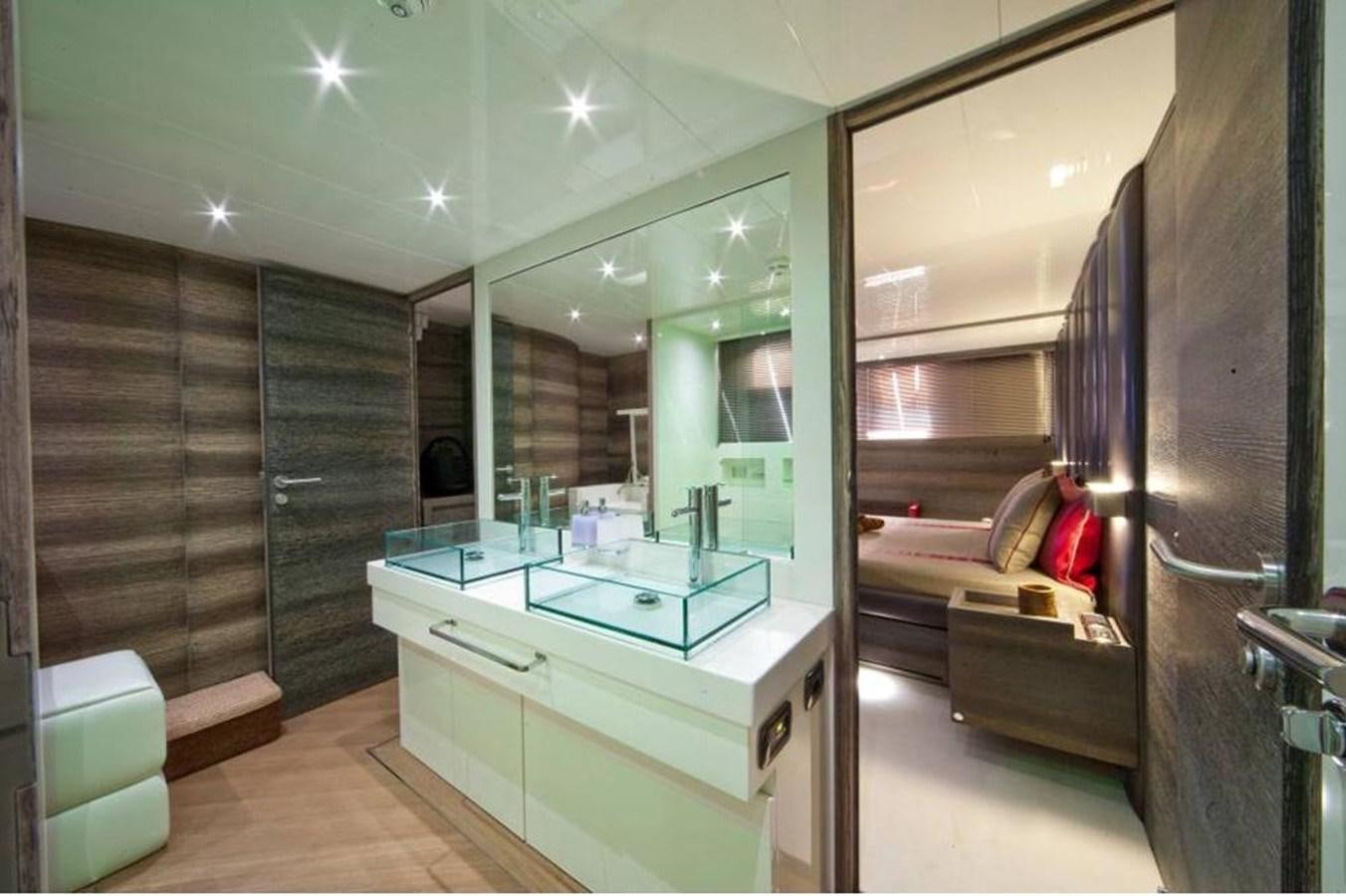 a bathroom with a large mirror aboard TOBY Yacht for Sale