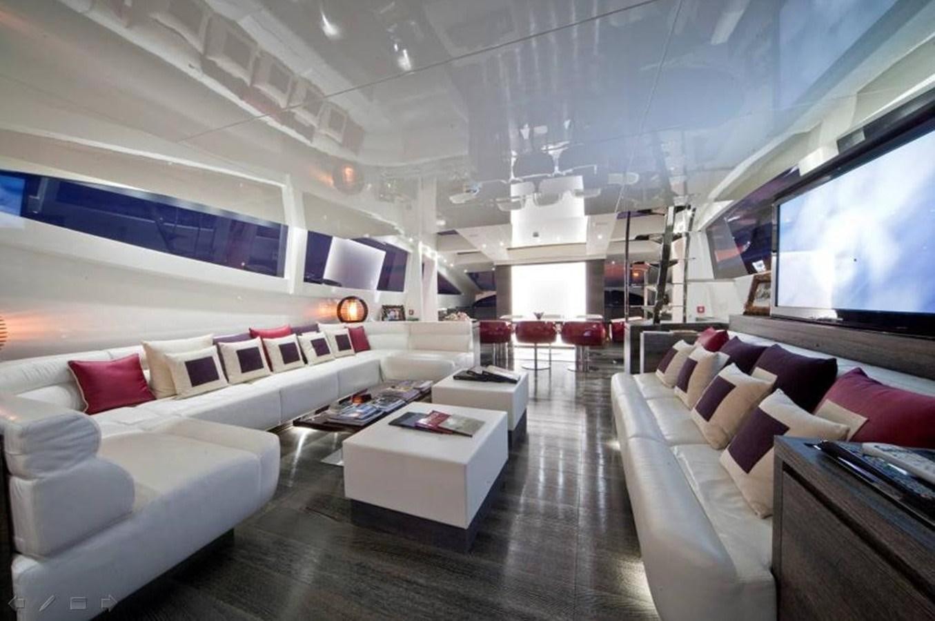 a room with a couch and a television aboard TOBY Yacht for Sale
