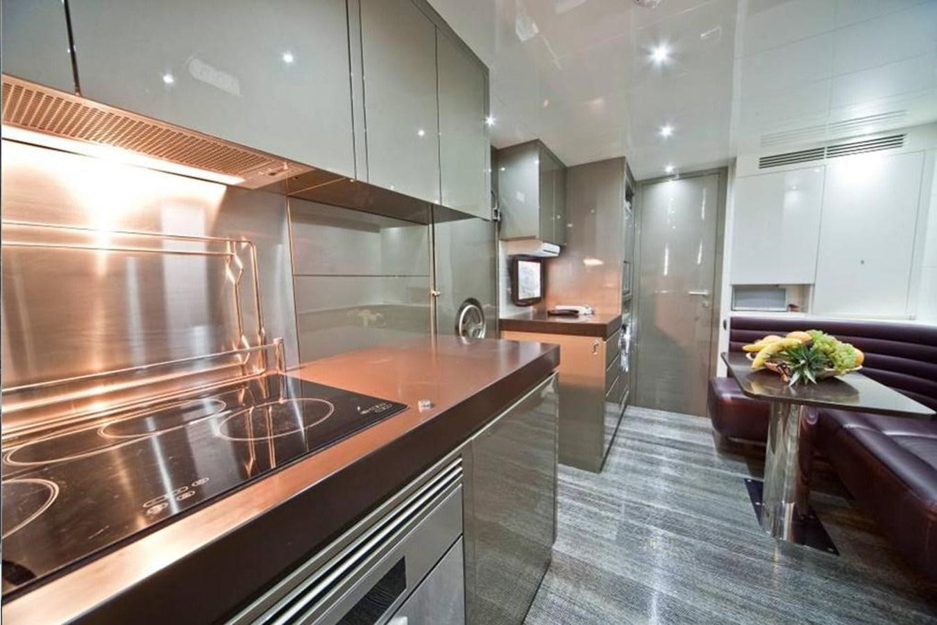 a kitchen with a large island aboard TOBY Yacht for Sale