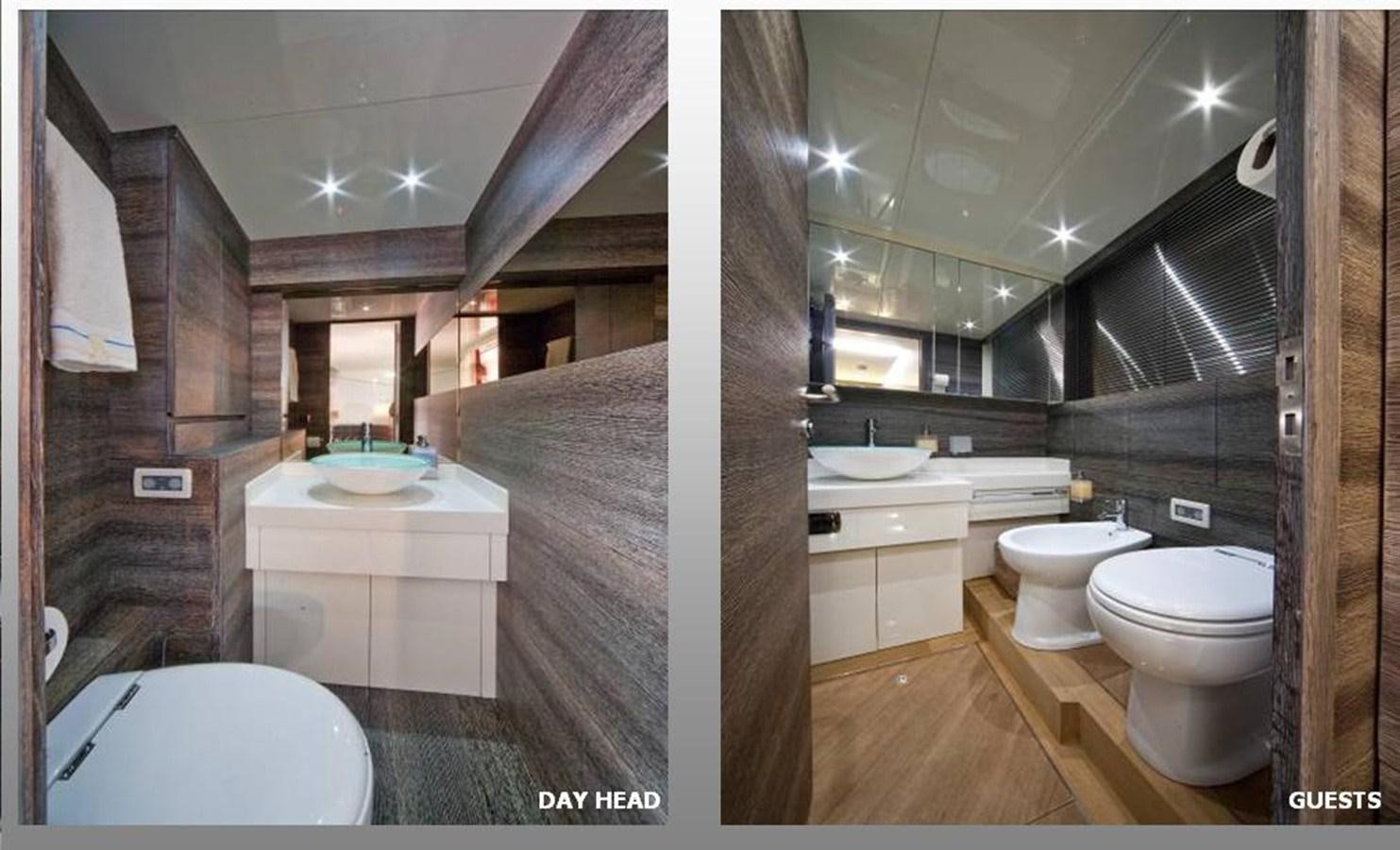 a bathroom with a large mirror aboard TOBY Yacht for Sale