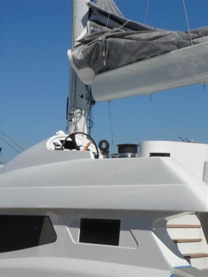 a person on a boat aboard 102' 2007 BLUBAY 102 Yacht for Sale
