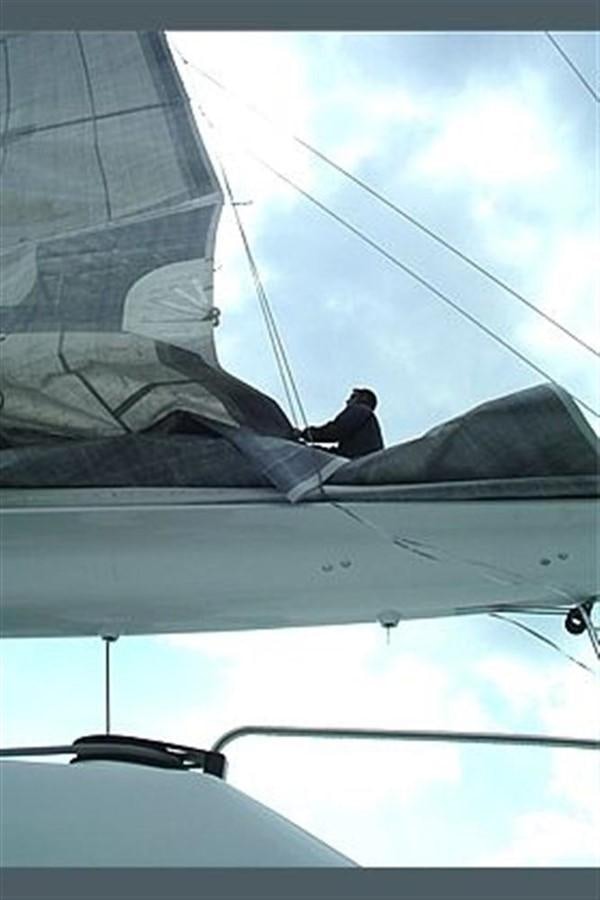 a person sitting on a plane aboard 102' 2007 BLUBAY 102 Yacht for Sale