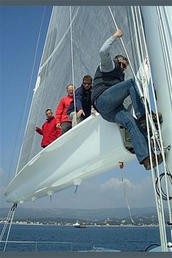 a group of people on a sailboat aboard 102' 2007 BLUBAY 102 Yacht for Sale