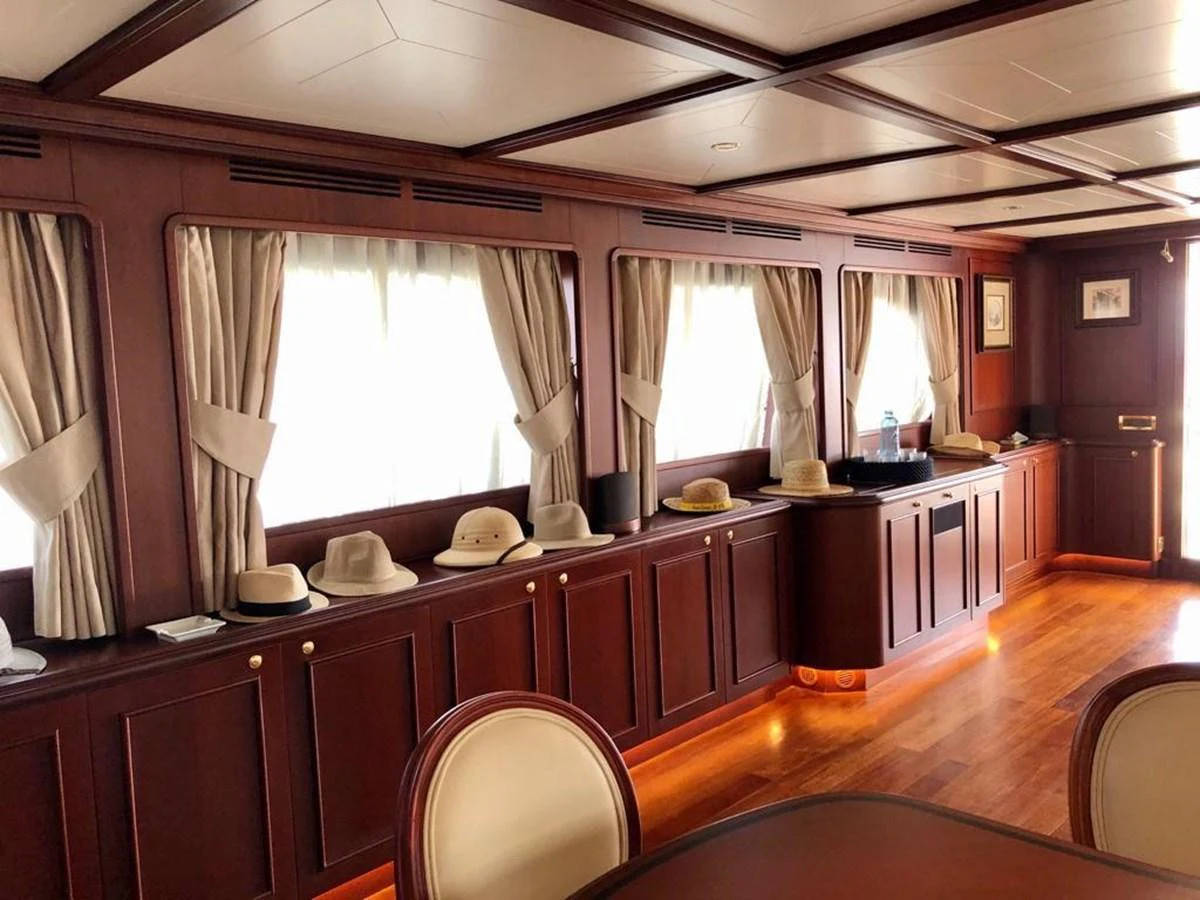 a kitchen with a large window aboard GIHRAMAR Yacht for Sale