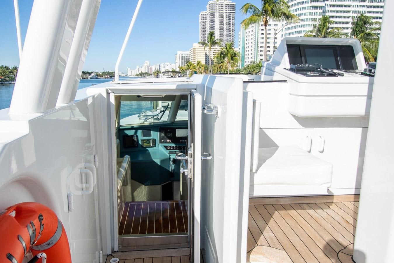a boat on a deck aboard HIGH LINE Yacht for Sale