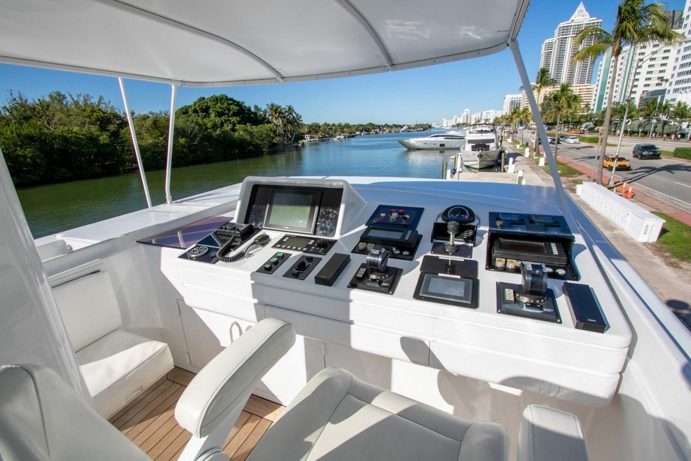 a group of cars parked in a parking lot aboard HIGH LINE Yacht for Sale