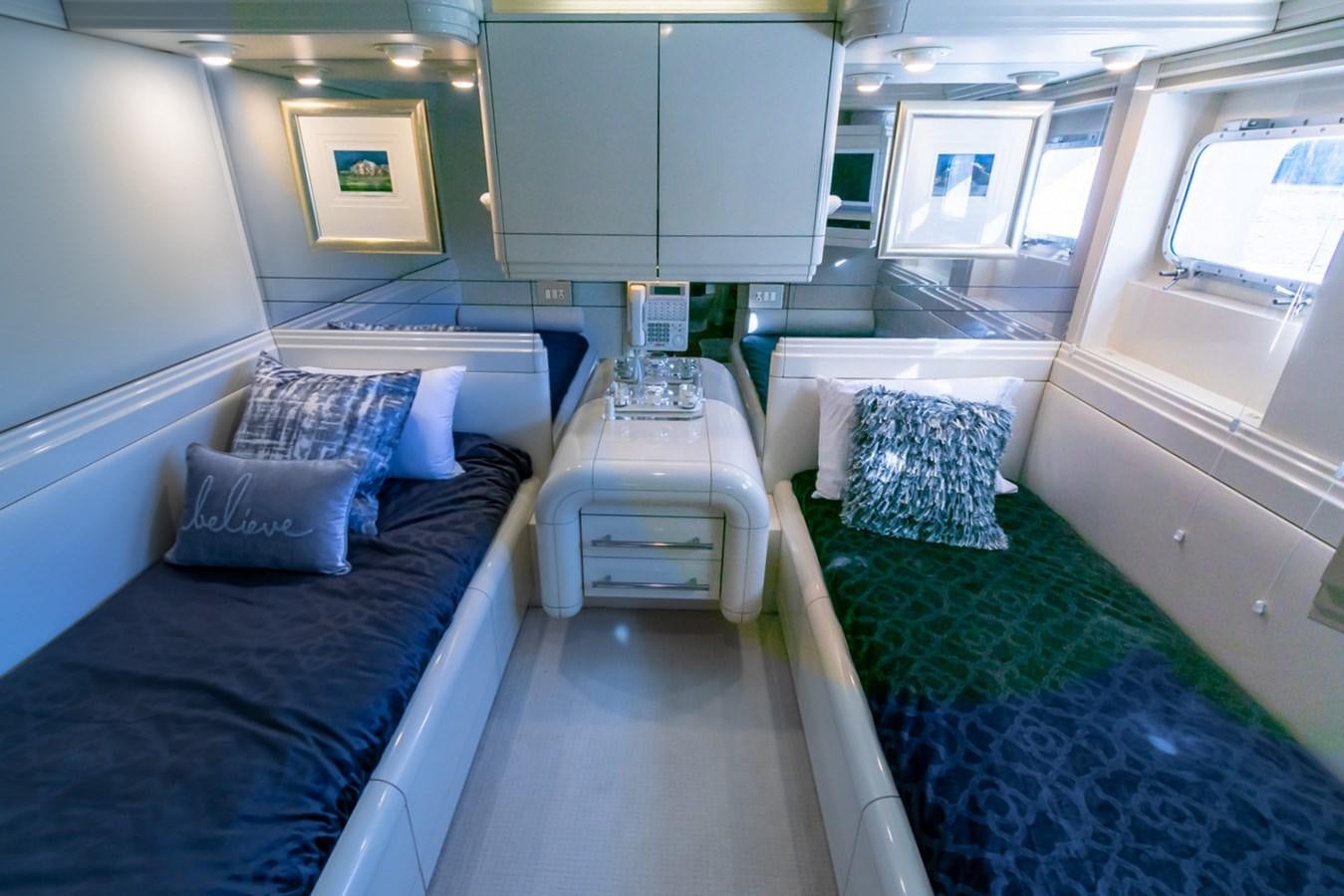 a room with a bed and a desk aboard HIGH LINE Yacht for Sale