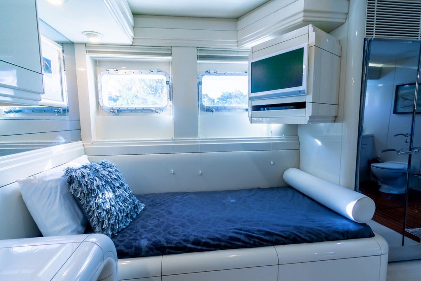 a bed in a room aboard HIGH LINE Yacht for Sale