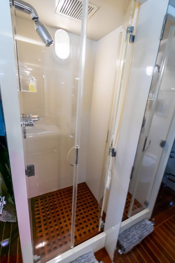 a shower with a glass door aboard HIGH LINE Yacht for Sale