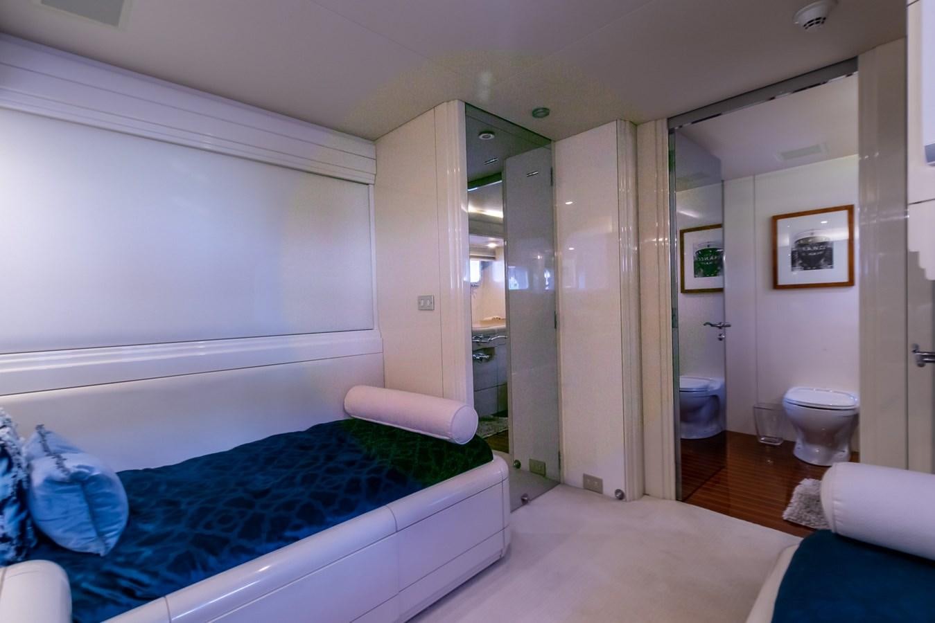 a bedroom with a large jacuzzi tub aboard HIGH LINE Yacht for Sale