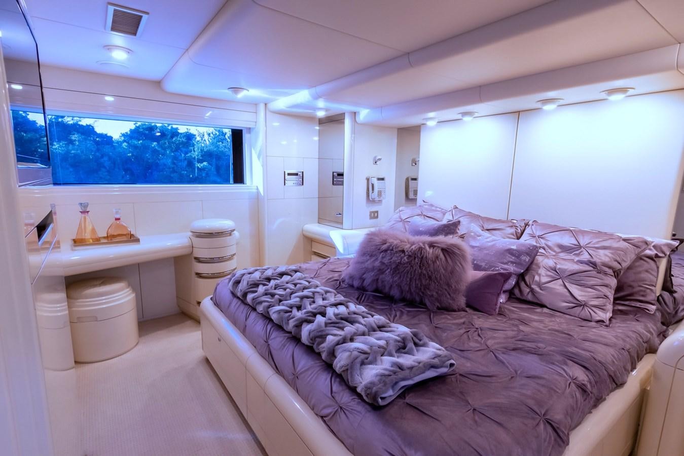 a bed in a room aboard HIGH LINE Yacht for Sale