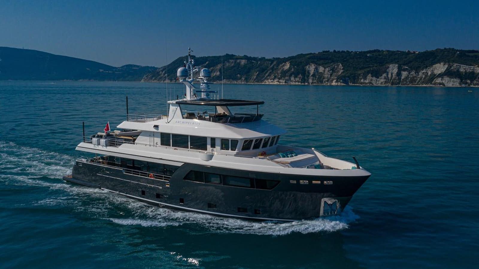 a boat on the water aboard DARWIN CLASS 102 Yacht for Sale