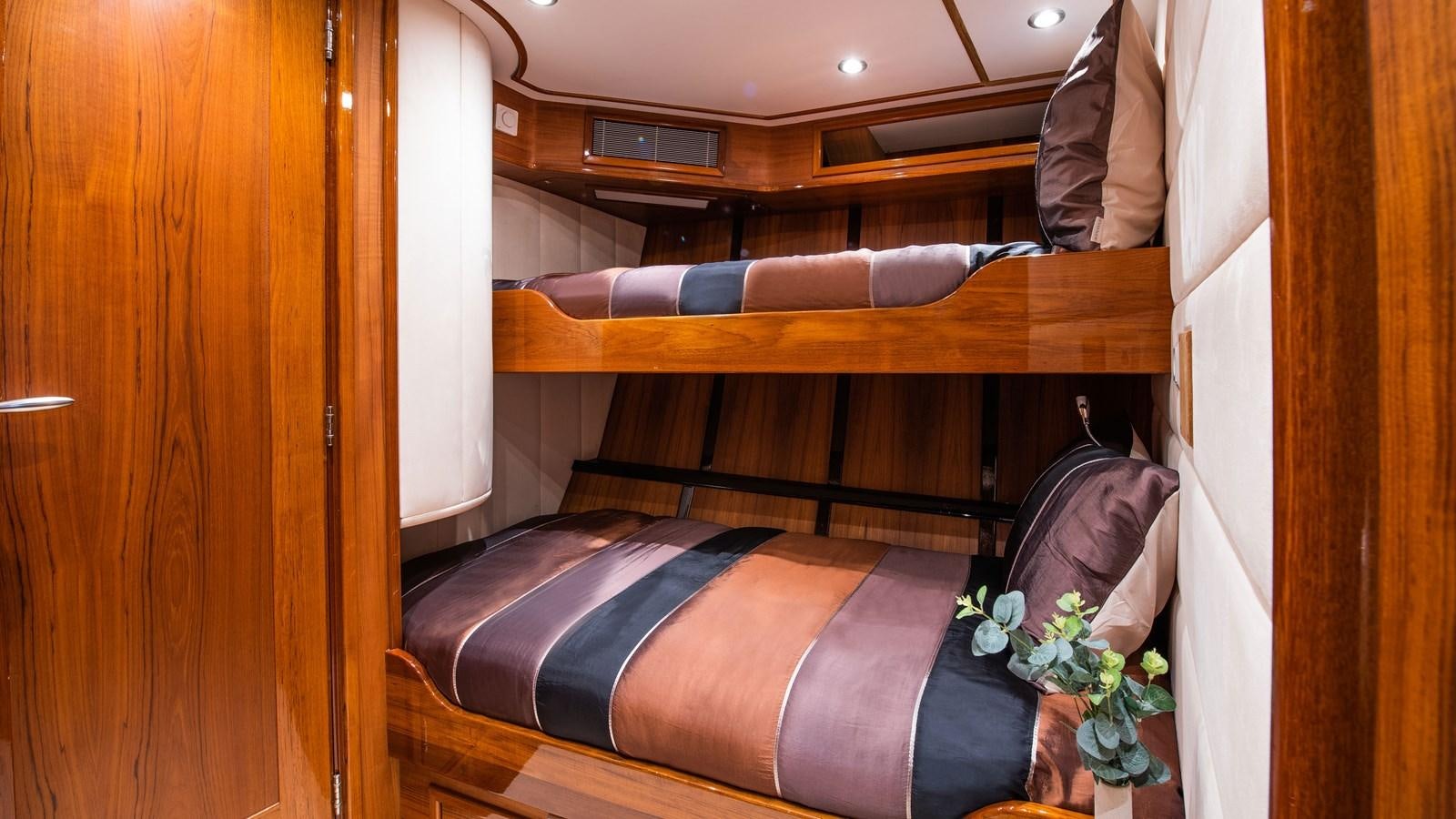 a bed in a room aboard BORKUMRIFF II Yacht for Sale