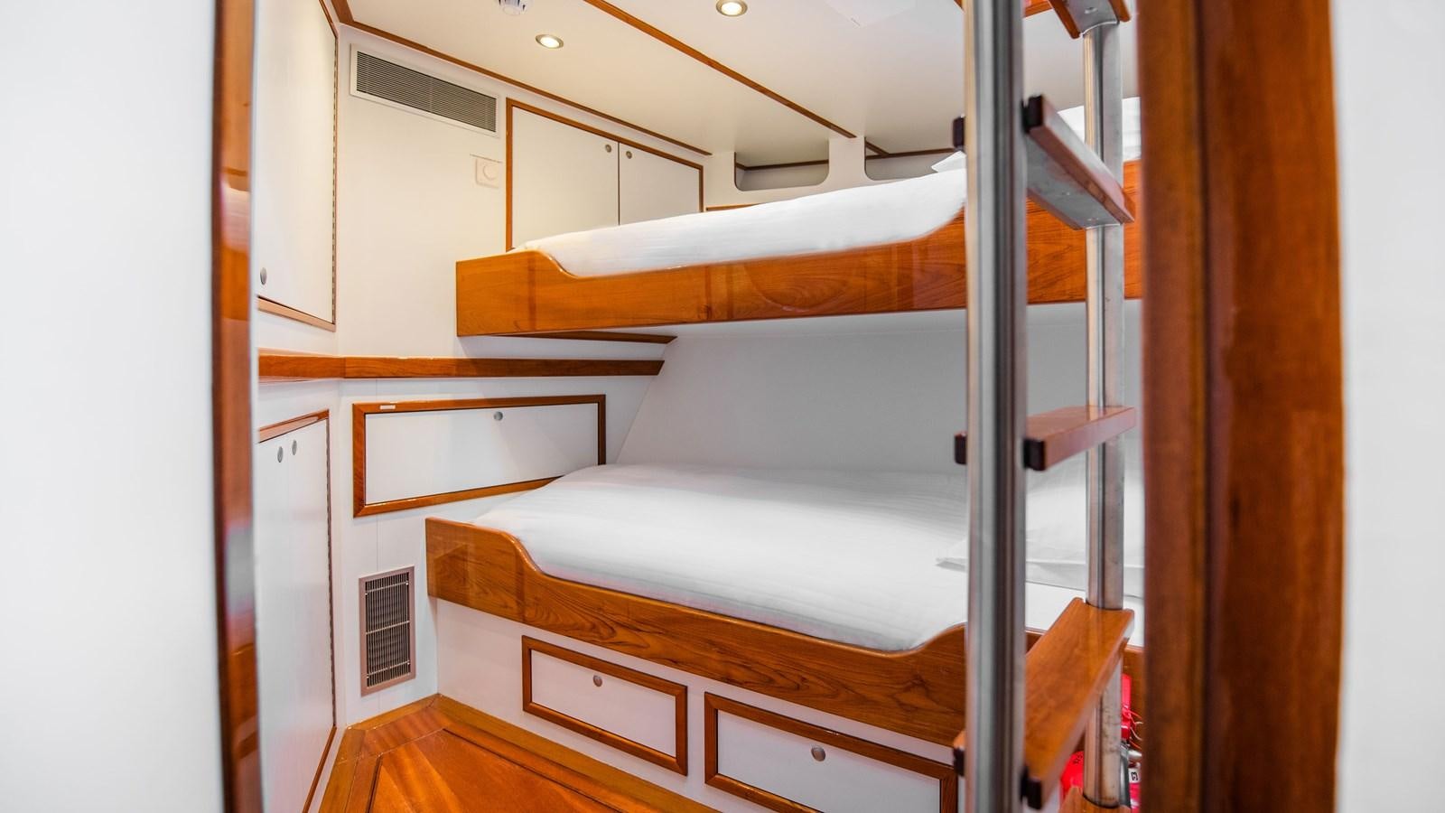 a room with bunk beds aboard BORKUMRIFF II Yacht for Sale