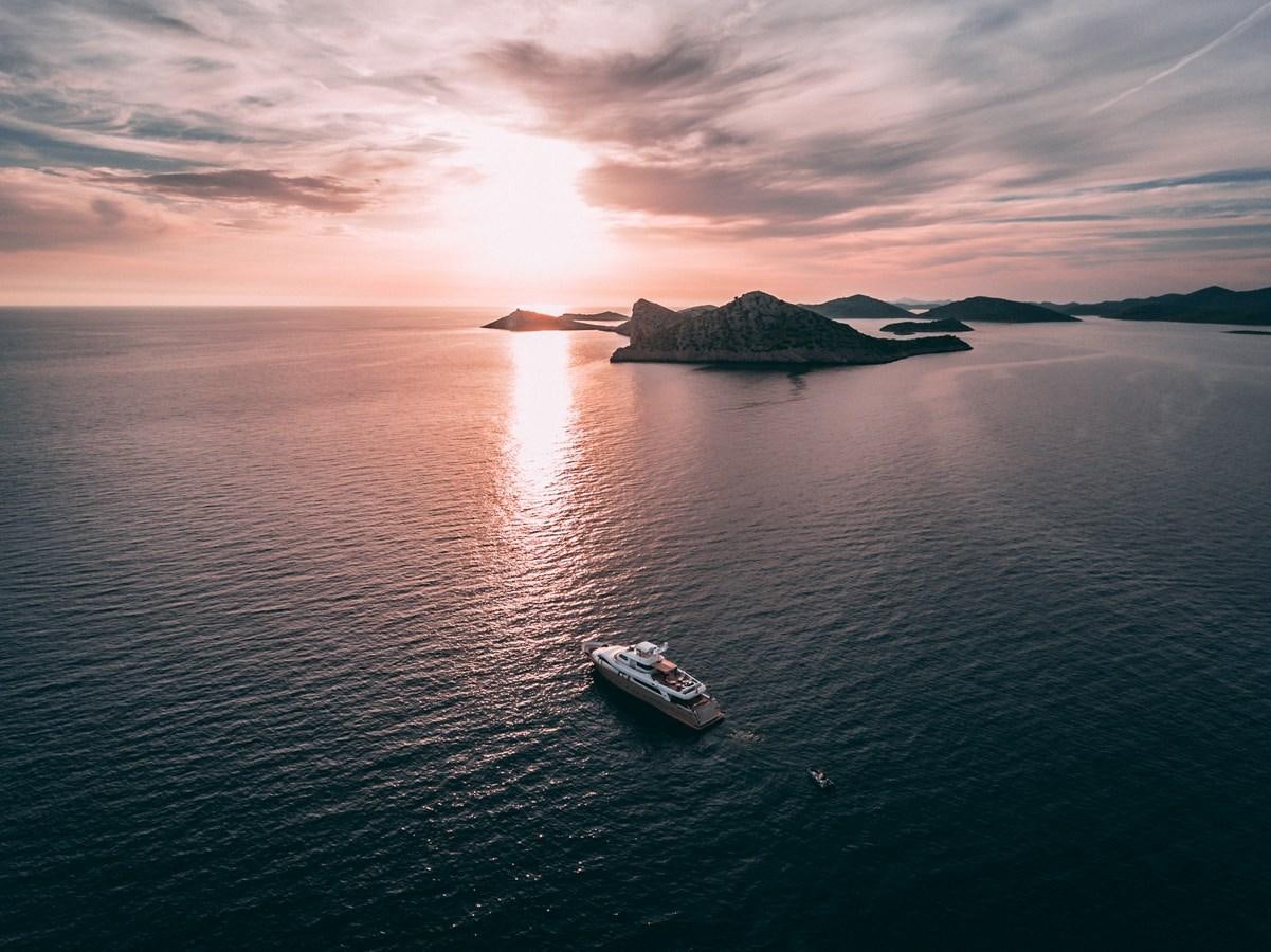 a boat on the water aboard IMAGINE Yacht for Sale