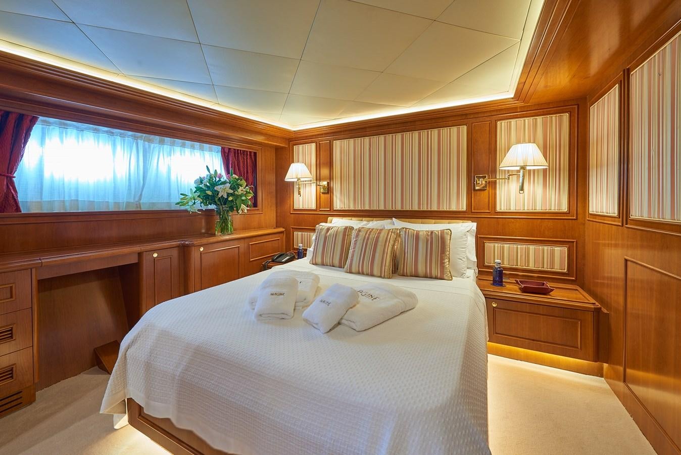a room with two beds aboard IMAGINE Yacht for Charter