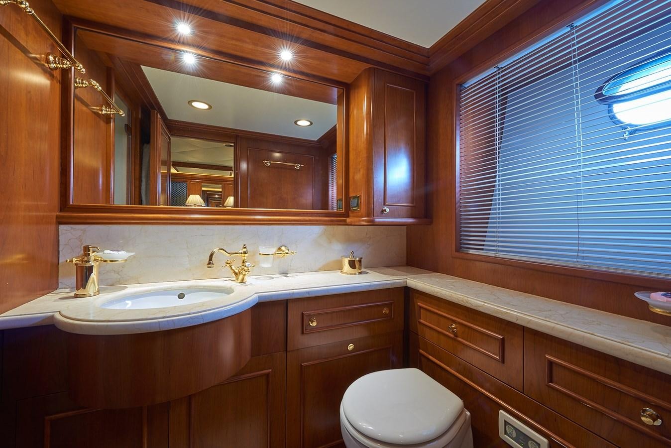 a bathroom with a large mirror aboard IMAGINE Yacht for Charter