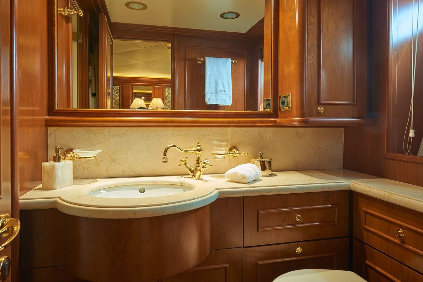 a bathroom with a large mirror aboard IMAGINE Yacht for Charter