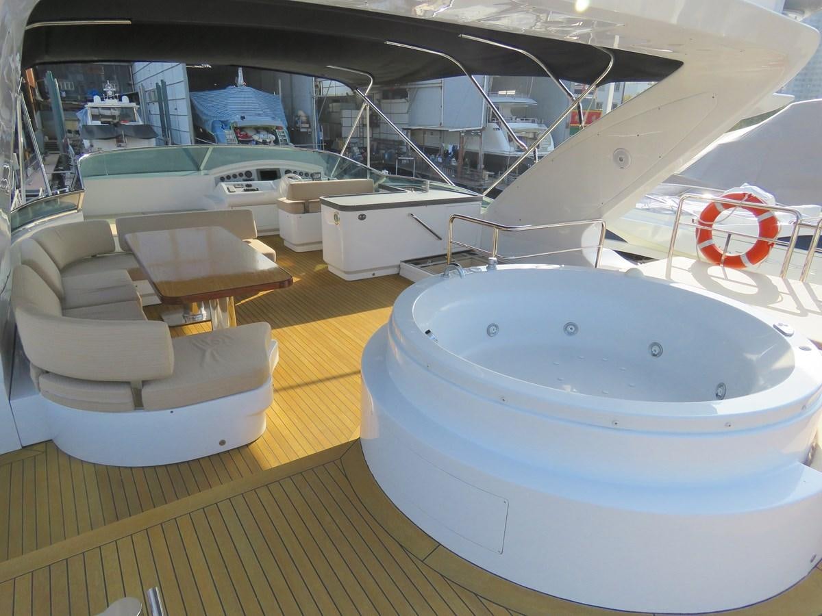 a room with a large white pool aboard AZIMUT 98/38 Yacht for Sale