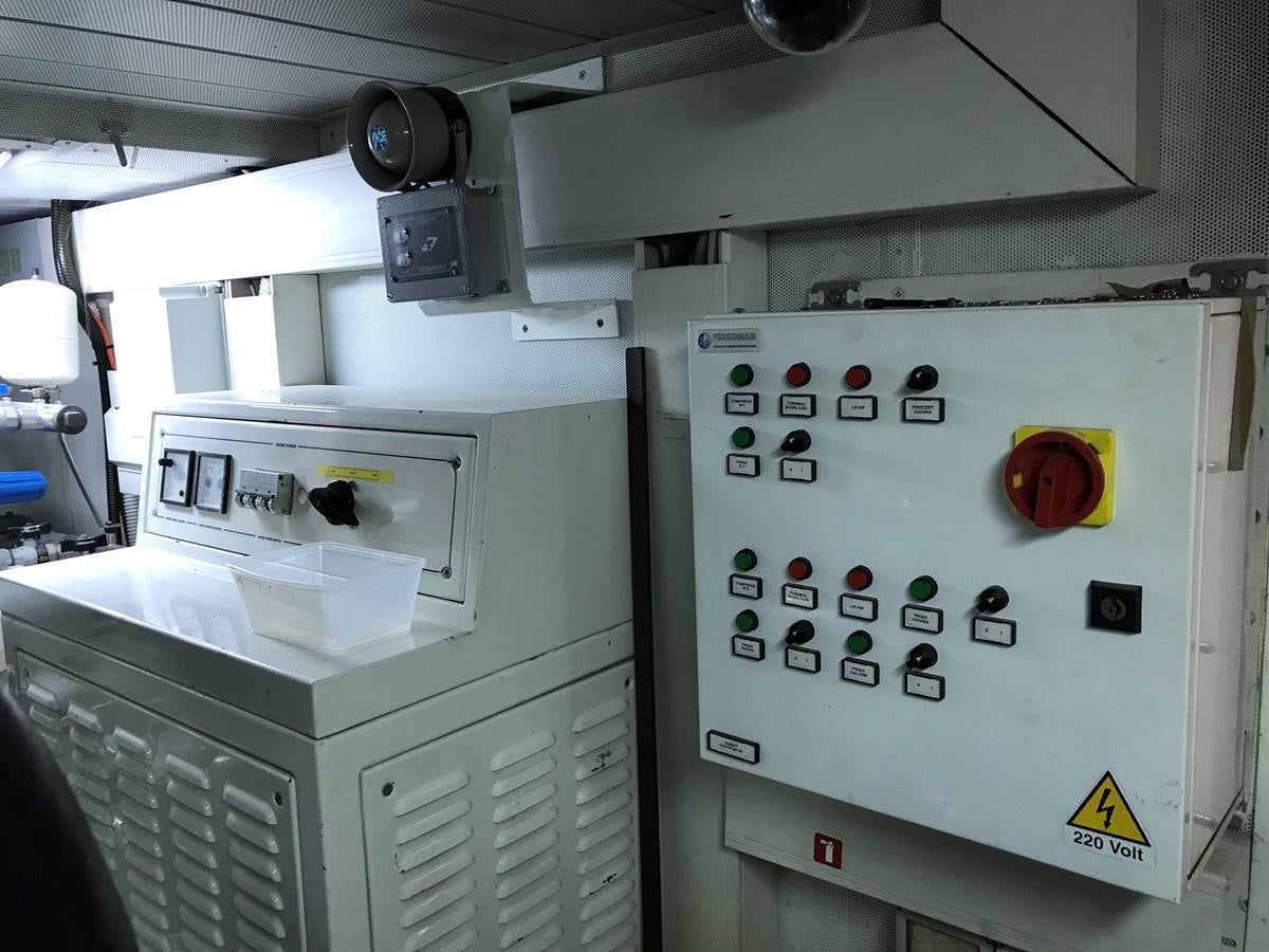a machine with buttons and switches aboard AZIMUT 98/38 Yacht for Sale