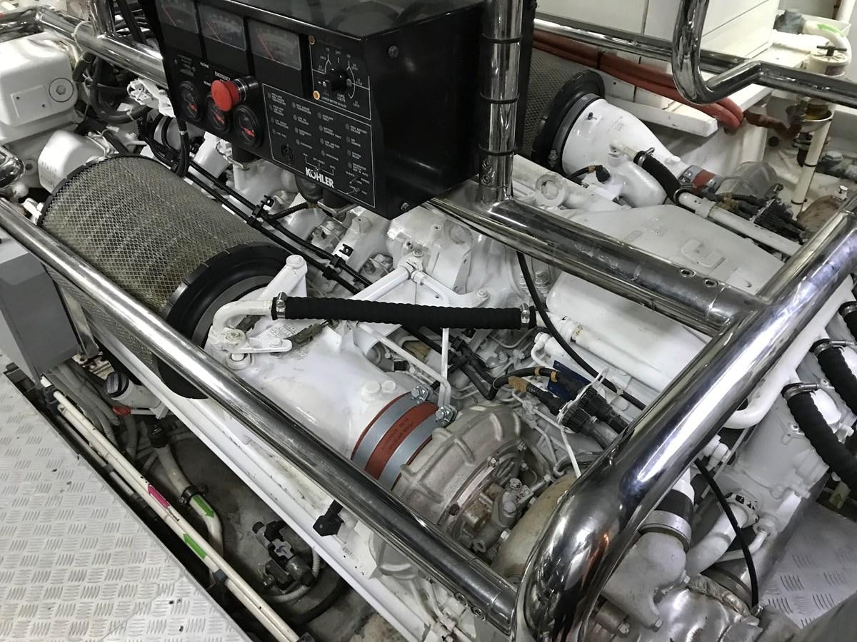 a close-up of a car engine aboard AZIMUT 98/38 Yacht for Sale