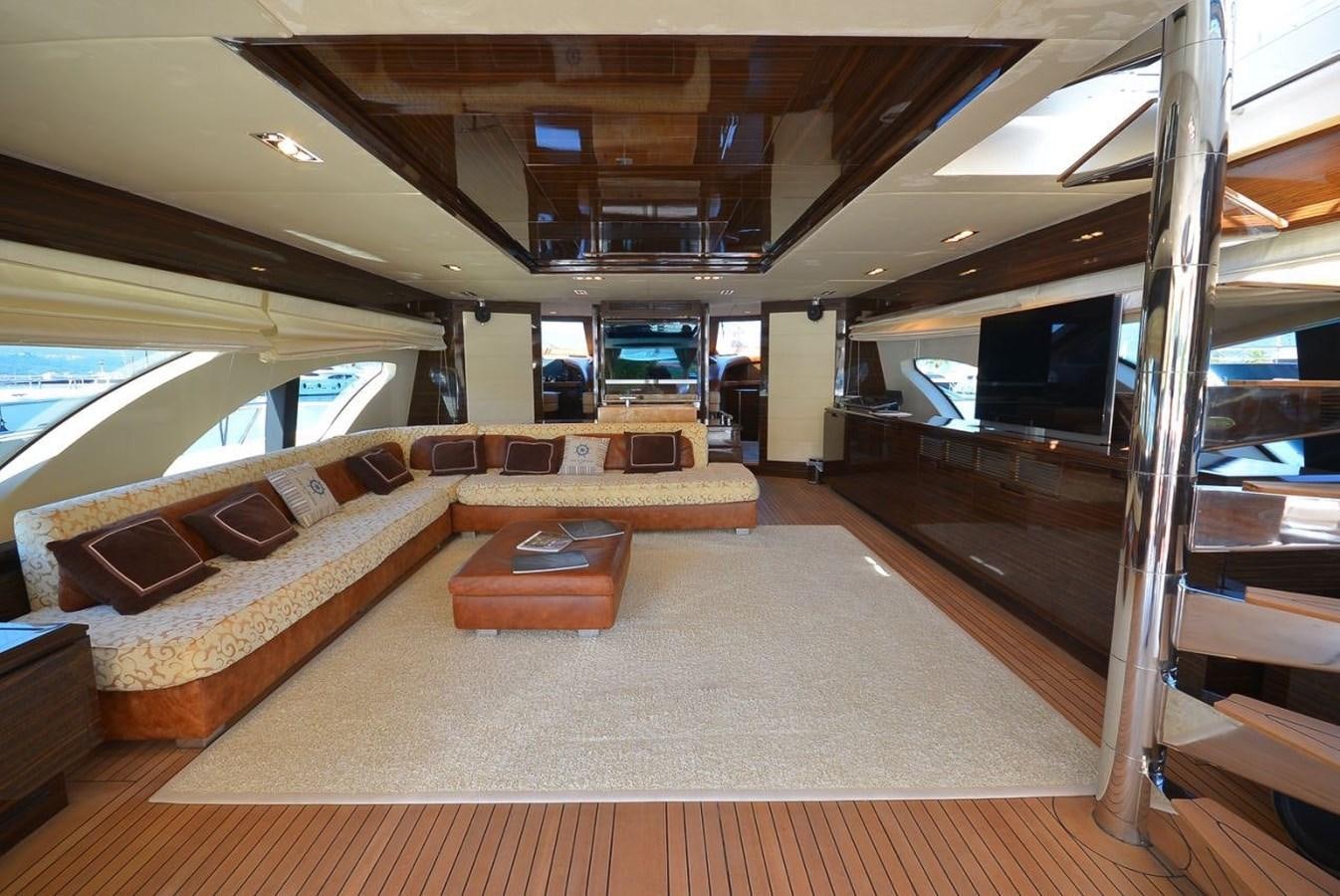 a room with a couch and a tv aboard JULIA DOROTHY Yacht for Sale