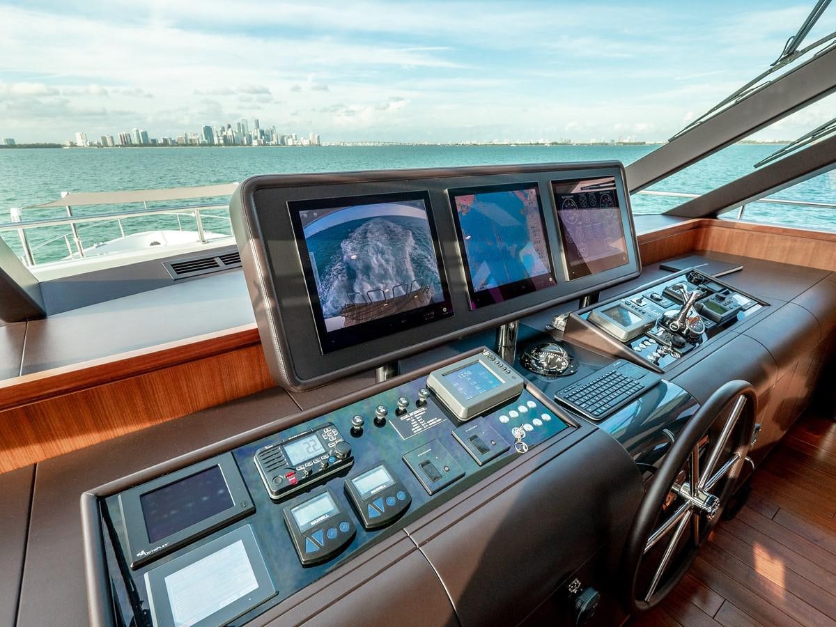 a group of computers on a table aboard SEA N SEA Yacht for Charter
