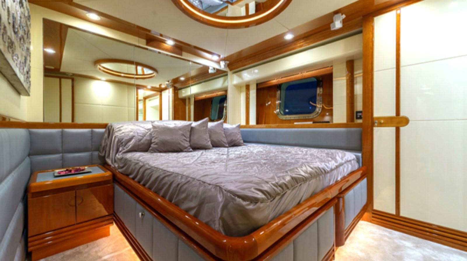 a bed in a room aboard NOVELA Yacht for Charter
