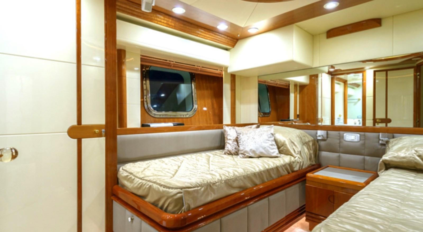a bed in a room aboard NOVELA Yacht for Charter