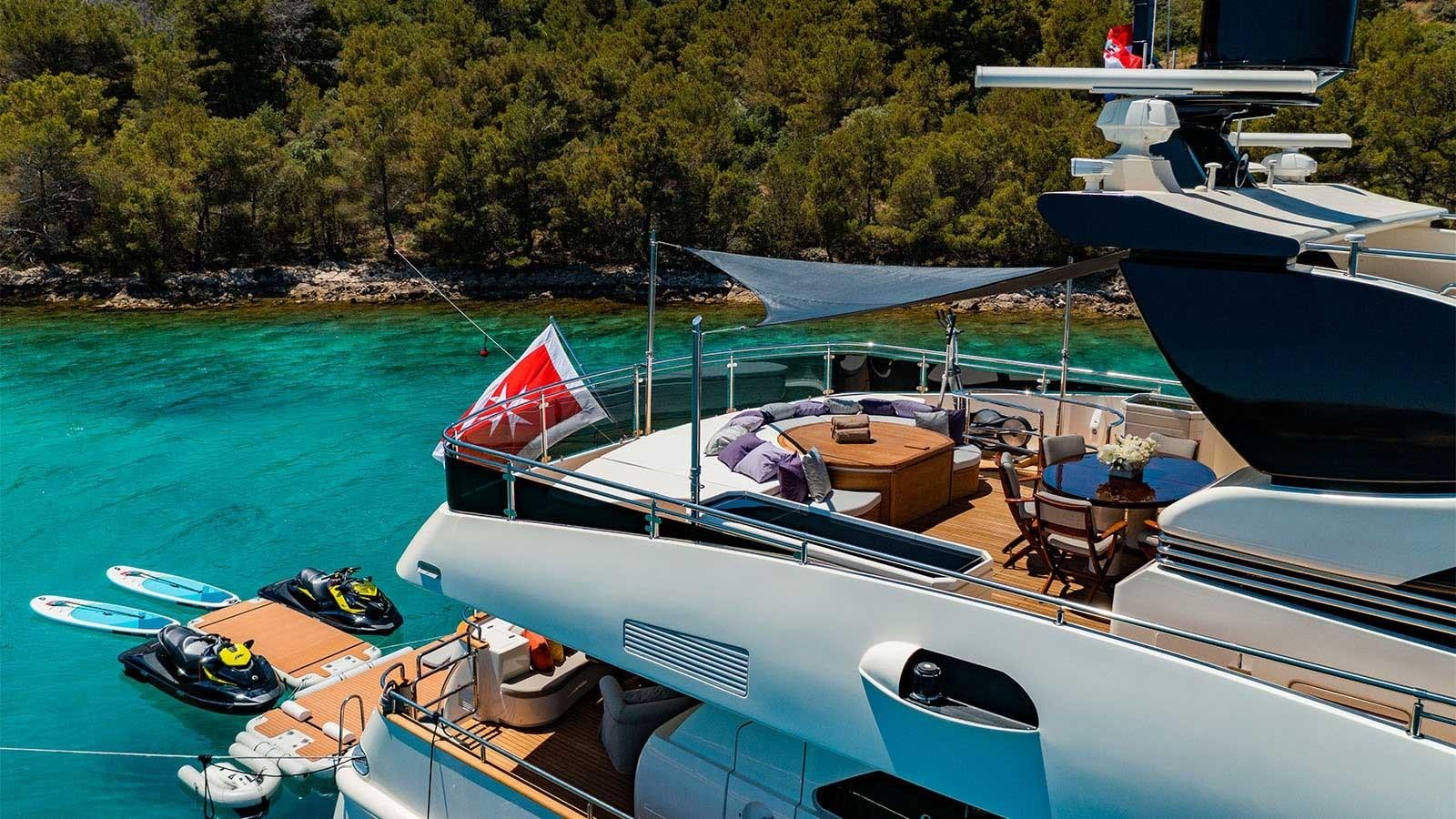 a boat docked at a pier aboard NOVELA Yacht for Sale