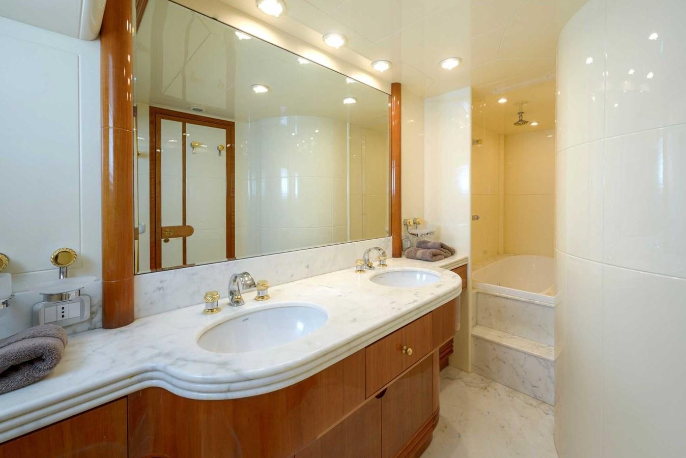 a bathroom with two sinks aboard NOVELA Yacht for Sale