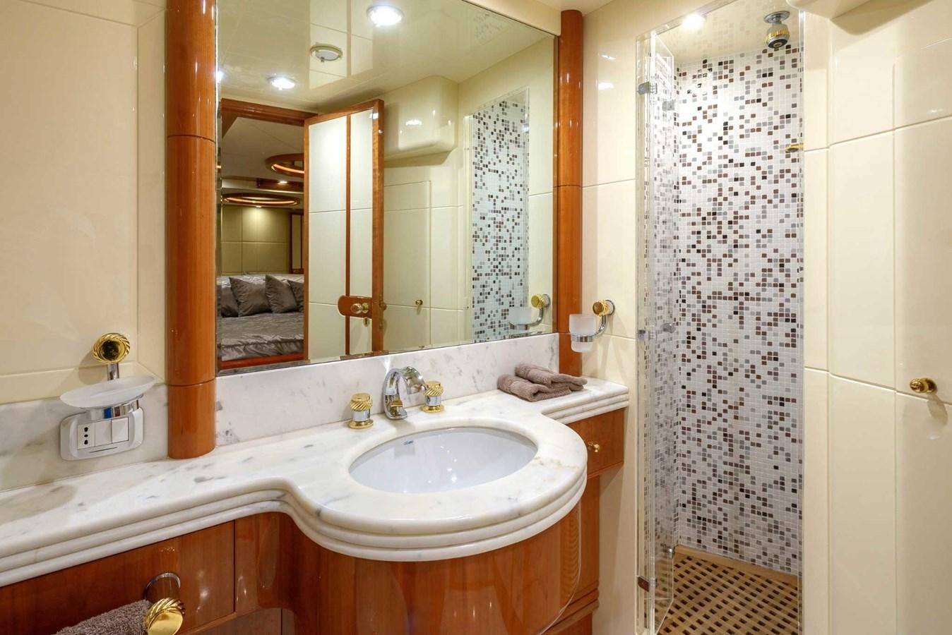 a bathroom with a sink and a mirror aboard NOVELA Yacht for Sale
