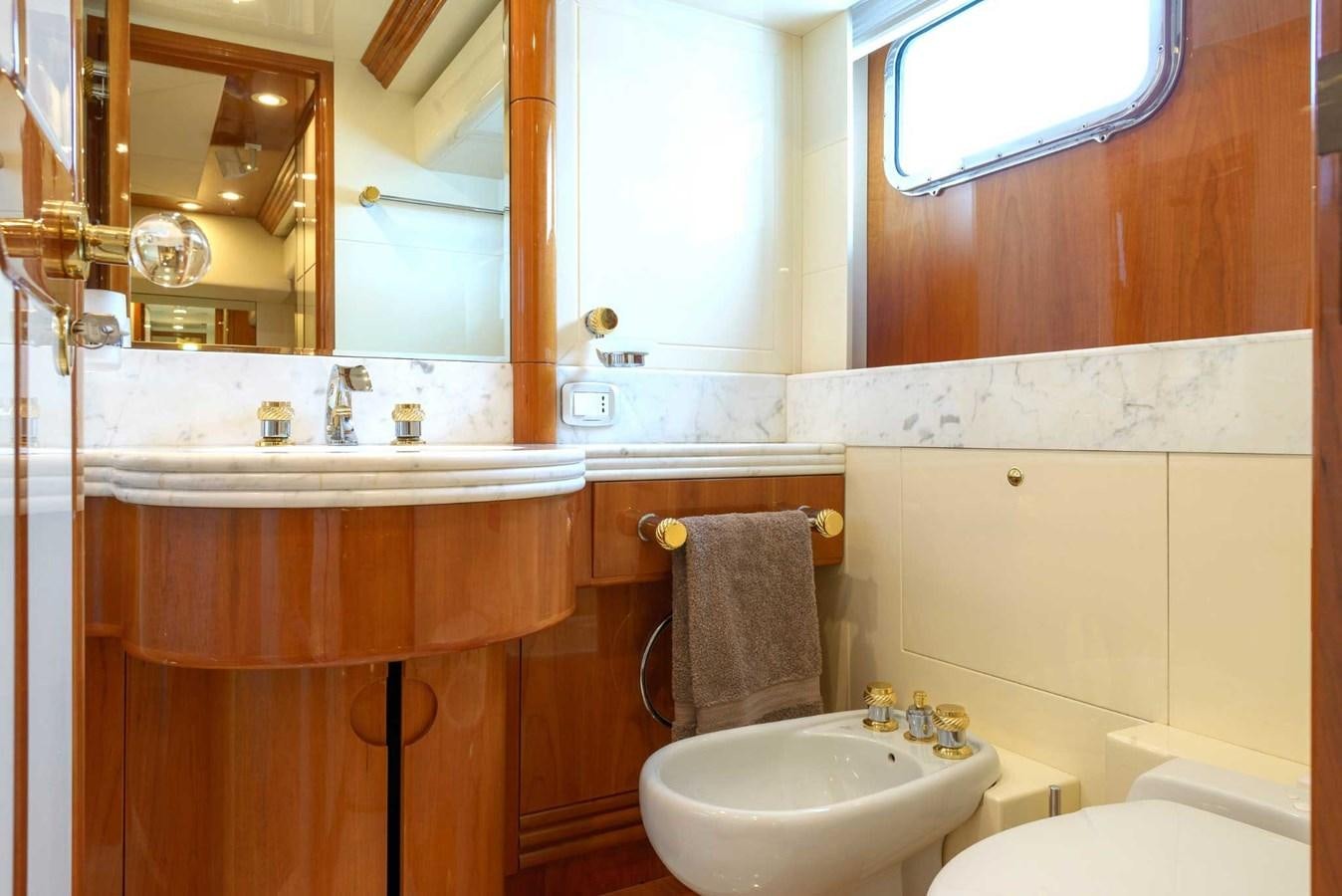a bathroom with a sink and a toilet aboard NOVELA Yacht for Sale