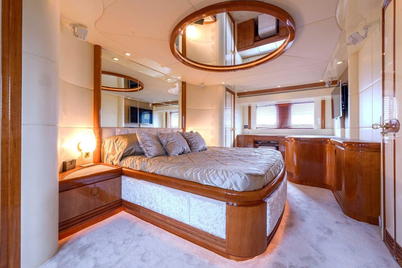 a bed in a room aboard NOVELA Yacht for Sale