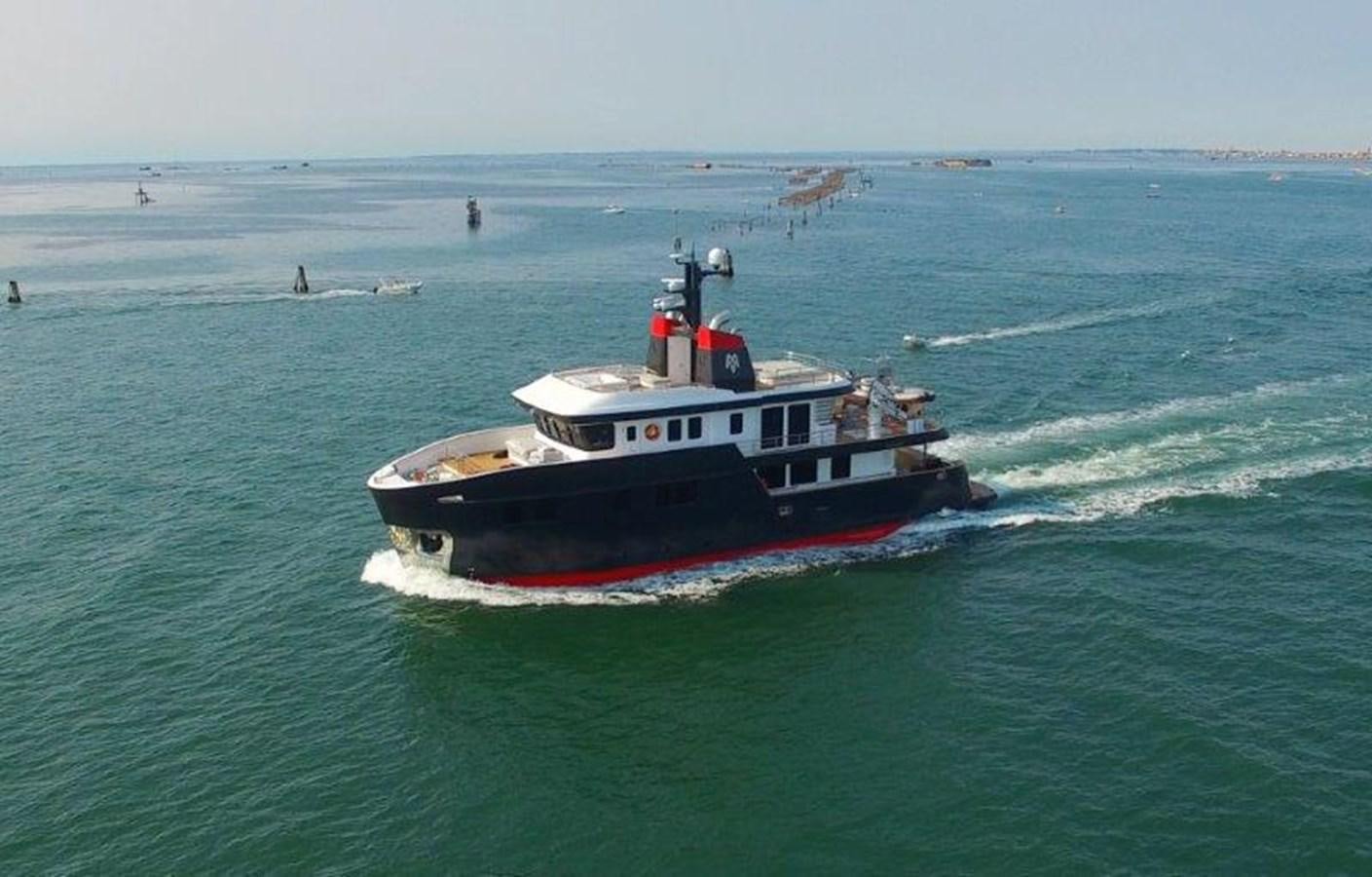 a boat in the ocean aboard OCEAN KING AMERICANA Yacht for Sale