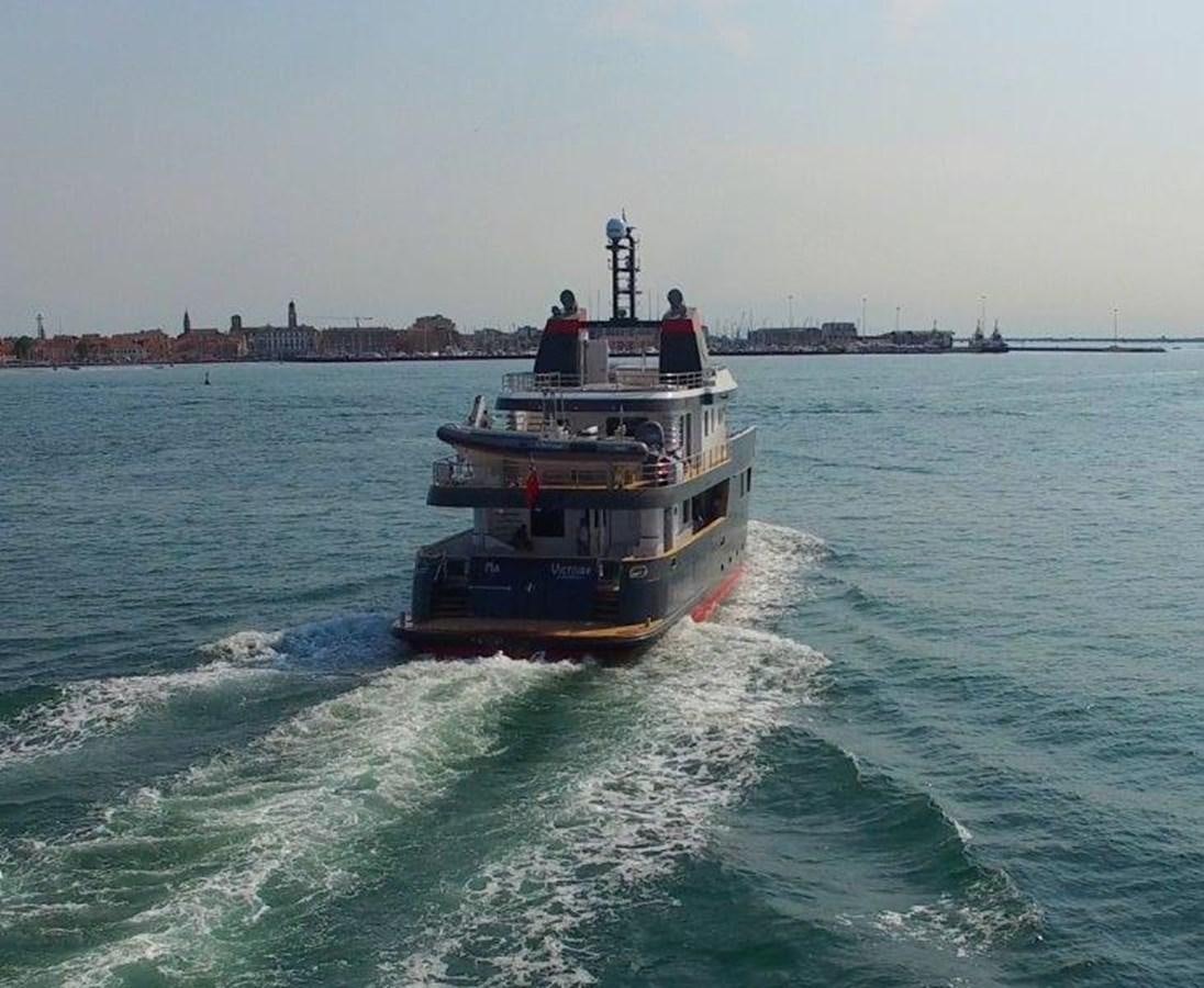 a boat on the water aboard OCEAN KING AMERICANA Yacht for Sale