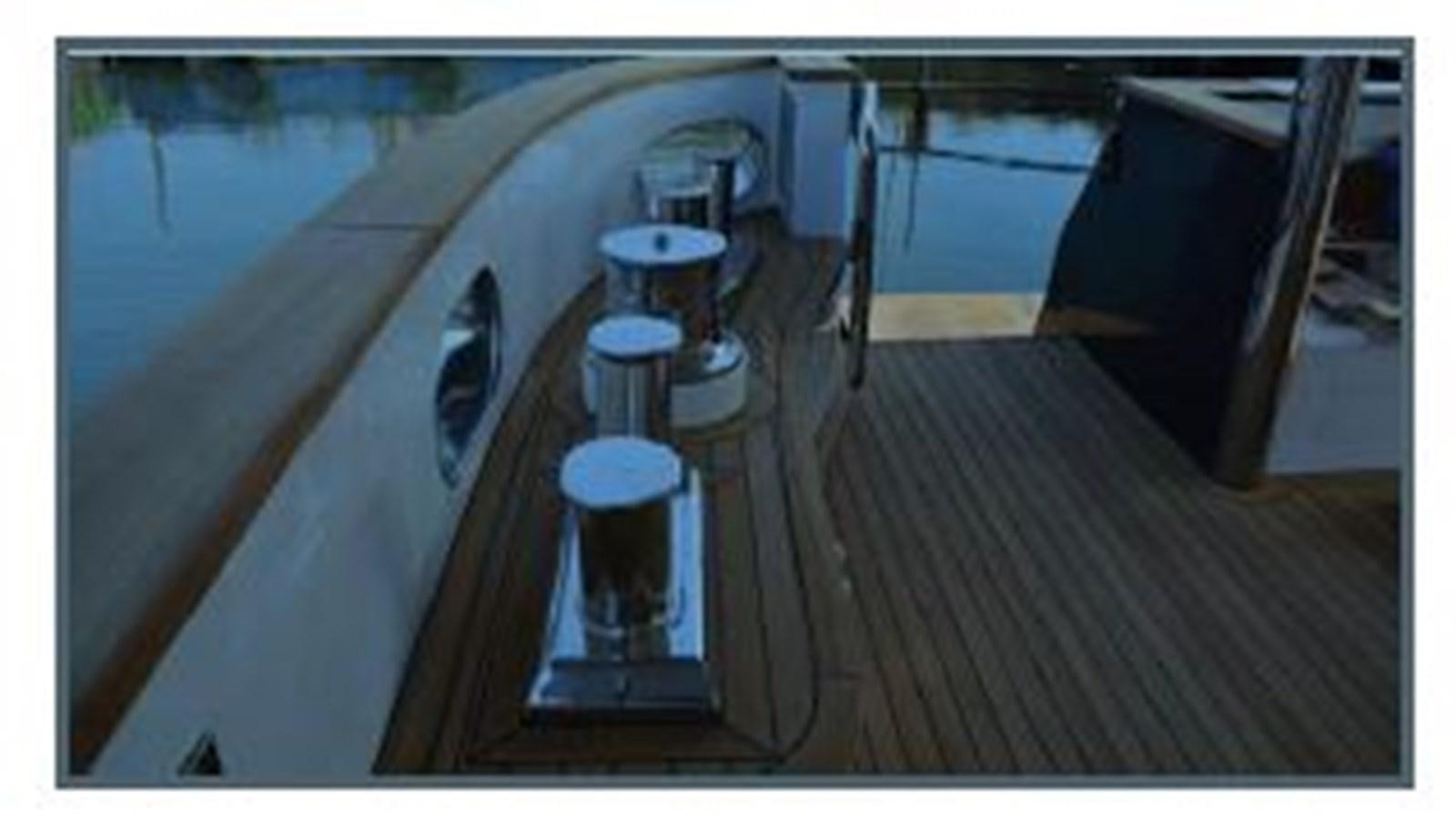 a boat on the water aboard OCEAN KING AMERICANA Yacht for Sale