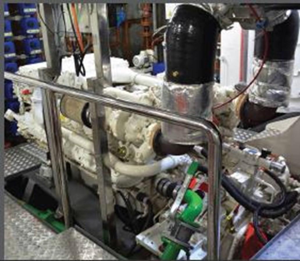 a machine with a large metal pipe aboard OCEAN KING AMERICANA Yacht for Sale