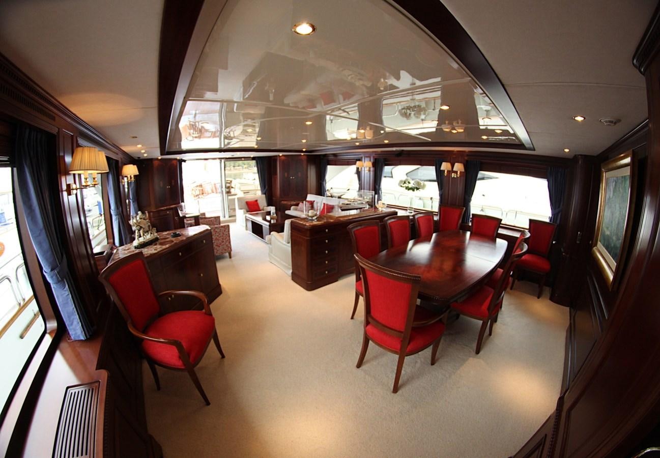 a room with a table chairs and a window aboard ANYPA Yacht for Sale