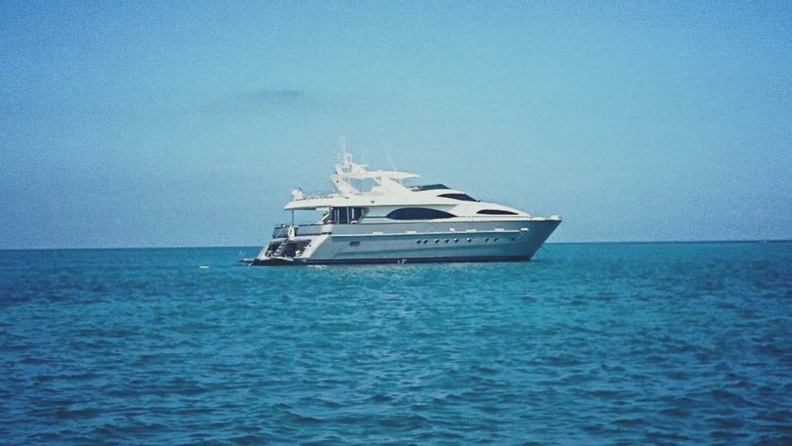 a white yacht in the water aboard AZIMUT 100' Yacht for Sale