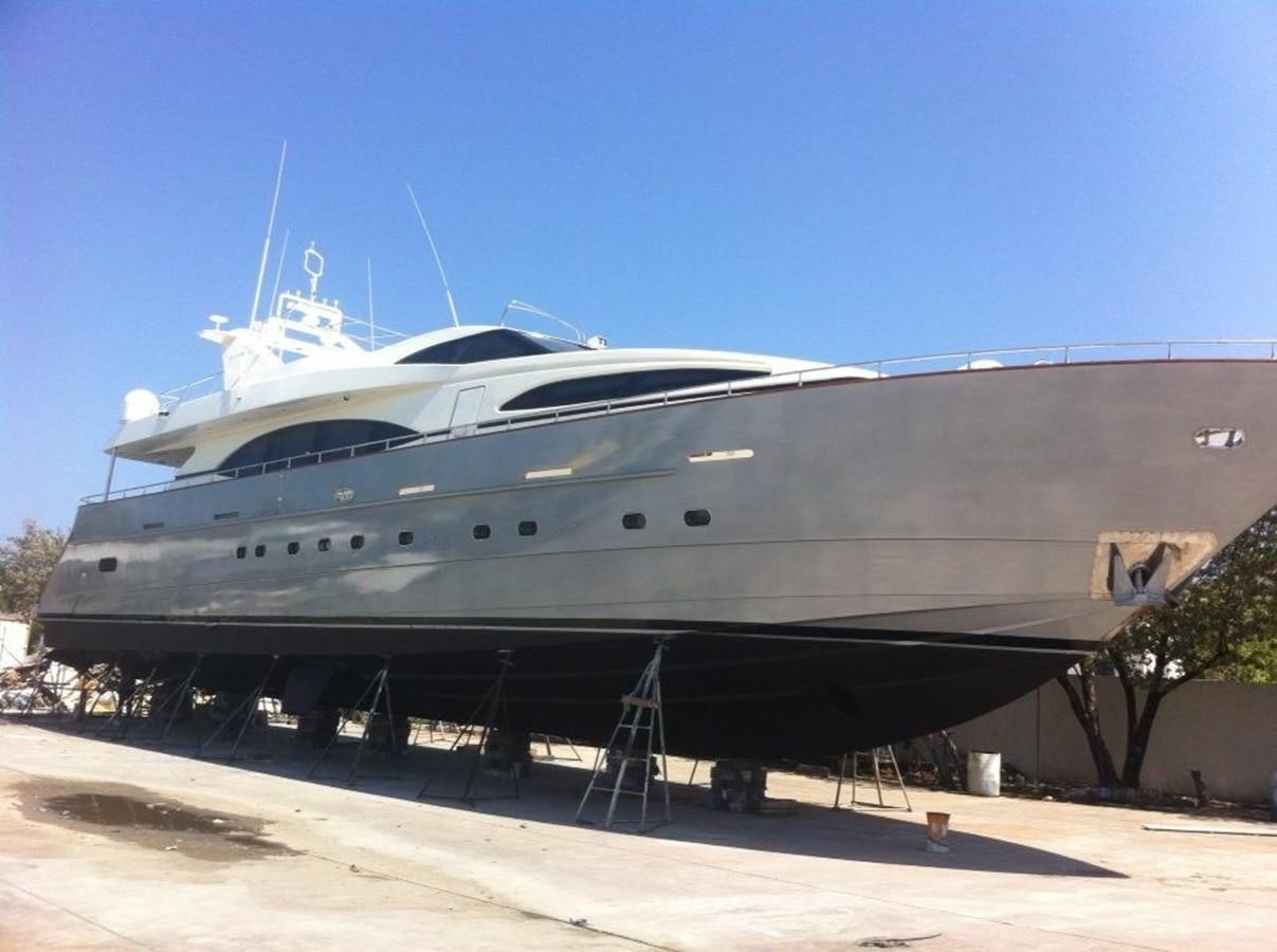 a large boat on a trailer aboard AZIMUT 100' Yacht for Sale